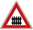 Railway crossing with barriers.