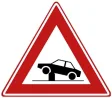 Warning for an electric retractable post in the roadway (bollard).